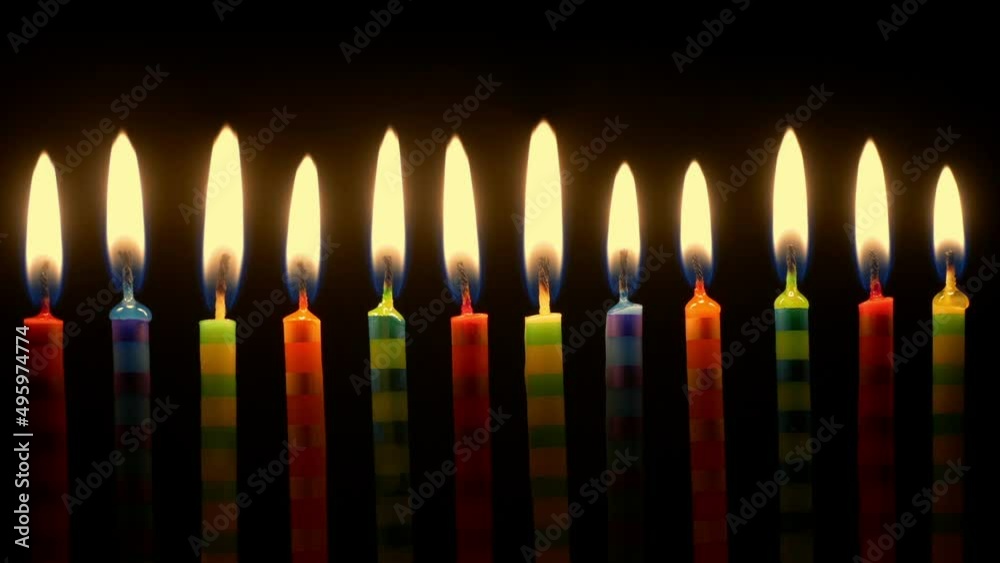 Colorful Birthday Candles Are Blown Out Closeup