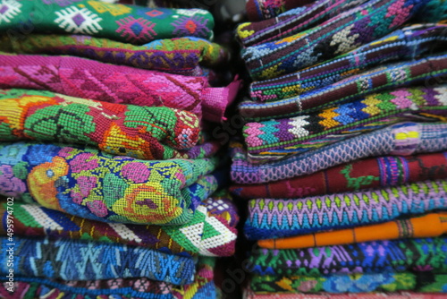 Handmade woven multicolor textiles with indigenous pattern in a souvenir bazar 