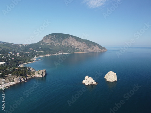 GURZUF, CRIMEA - Aerial Panoramic view on Gurzuf bay with Bear mountain Ayu-Dag and rocks Adalary, Artek - oldest children vacation camp. Yalta region, the South coast of Crimea peninsula photo