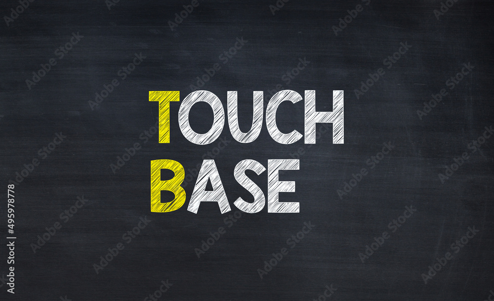 Touch base - TB acronym written on chalkboard, business acronyms. Touch base - TB acronym written on chalkboard, business acronyms.