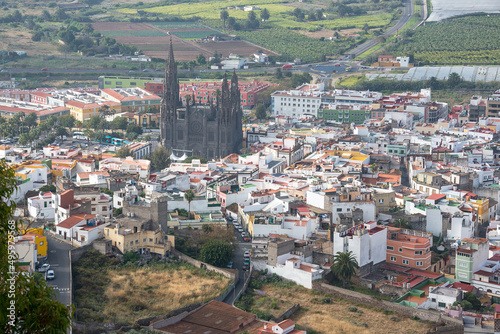 Vista del pueblo de Arucas y parroquia de San Juan Bautista en la isla de Gran Canaria photo