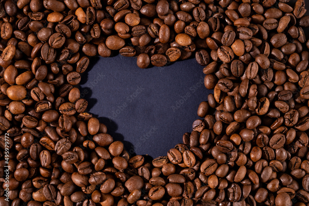 Coffee beans and heart pattern inside Coffee beans and heart pattern inside