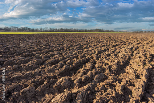 Plowed field with beautiful sky in the background