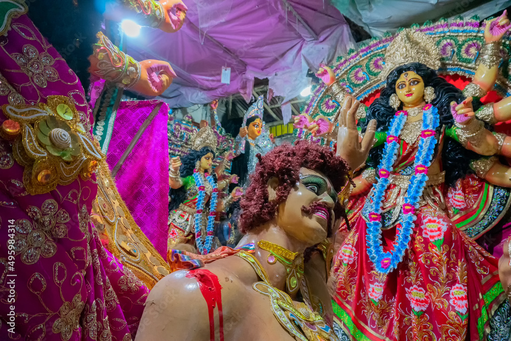Fototapeta premium Kolkata, West Bengal, India - 7th October 2018 : Clay idol of Goddess Durga, under preparation for 