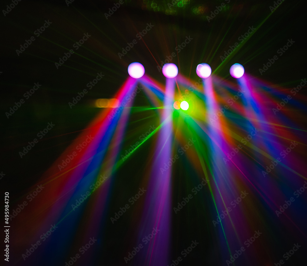 Obraz premium Color disco club light with special effects and laser show