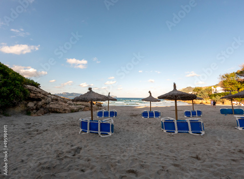 Beach with white sand and turquoise water of the Mediterranean sea in Alcudia, Mallorca, or Majorca, Balearic Islands, Spain © nomadkate