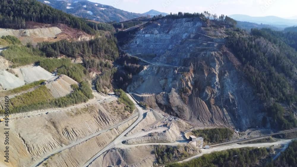 Aerial view of a huge surface mining area at a mountain in Austria Aerial view of a huge surface mining area at a mountain in Austria