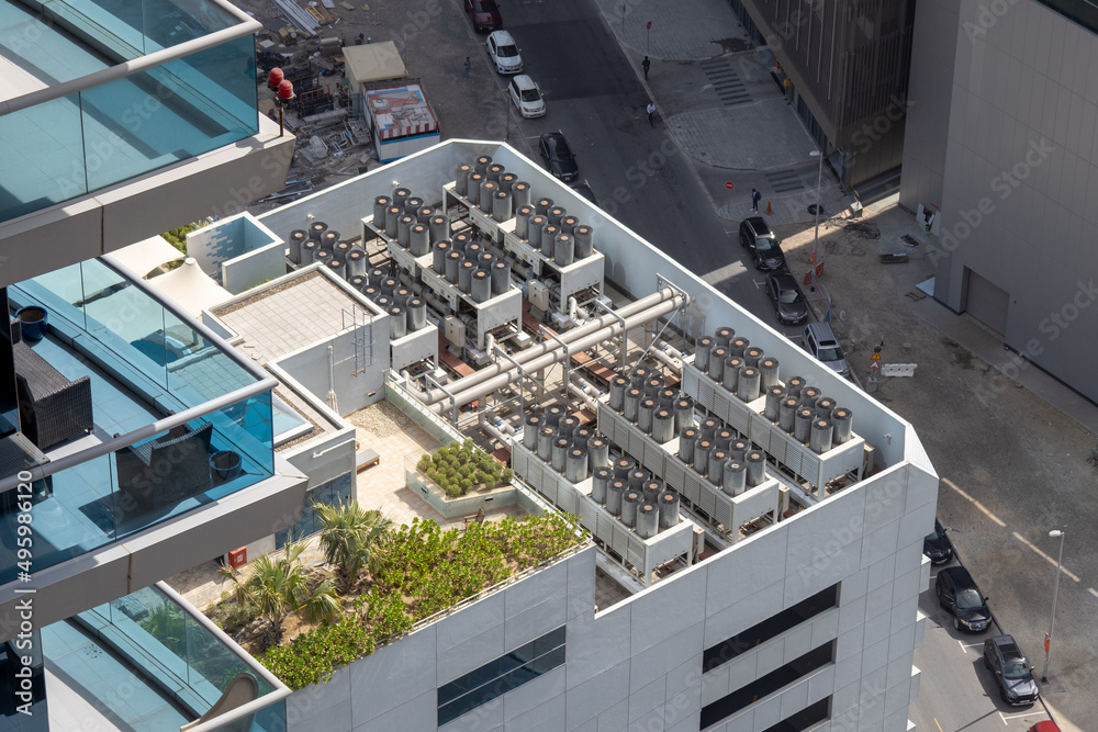 Mounted units of the air conditioning system on a modern skyscraper. A highrise building with