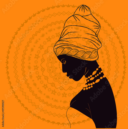 Silhouette of a young beautiful African woman and mandala.  Africa. Princess with dark brown skin with a turban on her head. Profile. Logo, avatars. Fashion. Advertising. Digital vector illustration