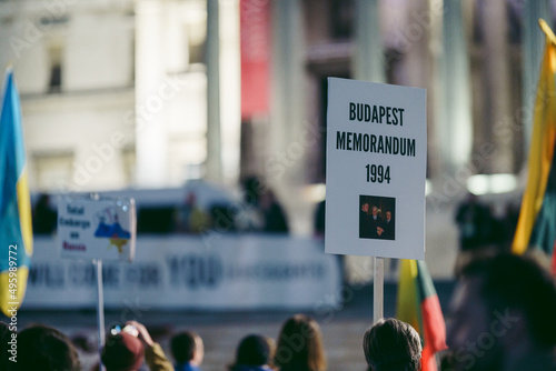 Ukrainian people protest, thousands gather to demand tougher sanctions on Russia from British Government, EU and USA to stop the war in Ukraine photo