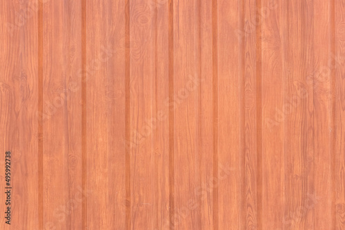 Brown-orange light artificial wooden coating imitation of natural fence texture wood background