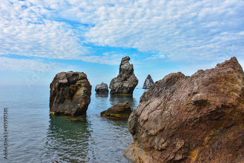 rocky shore of Black Sea, landscape with rocks on seashore, rocks sticking out of sea