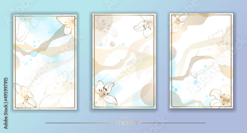 Golden frame with lilies. Set of gilded lily flowers and branches. Blue watercolor stains. Modern minimalist design. Vector illustration.