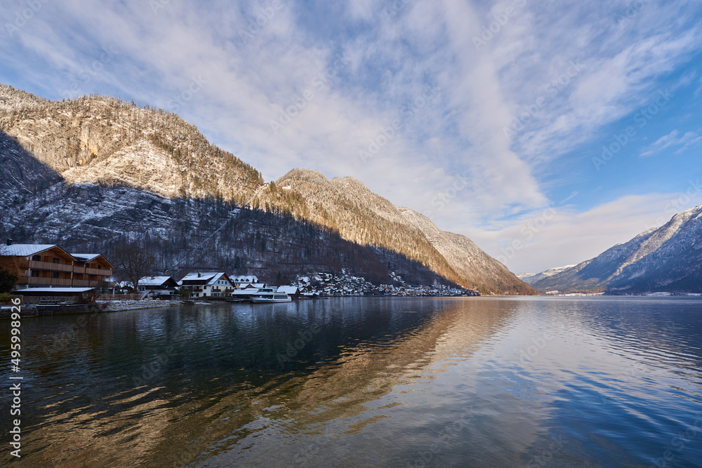 Beautiful winter landscape of Hallstatt mountain village with Hallstatter lake in Austrian Alps