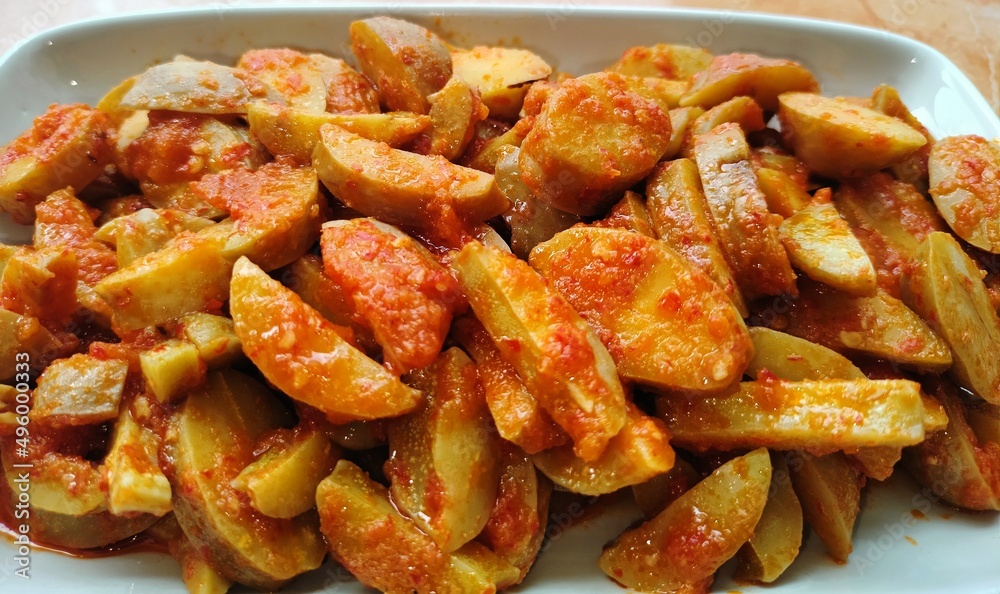 Spicy jengkol balado or jengkol stew, made from jengkol seeds or dogfruit with Indonesian spices, one of the popular dishes from Indonesia
Spicy jengkol balado or jengkol stew, made from jengkol seeds or dogfruit with Indonesian spices, one of the popular dishes from Indonesia