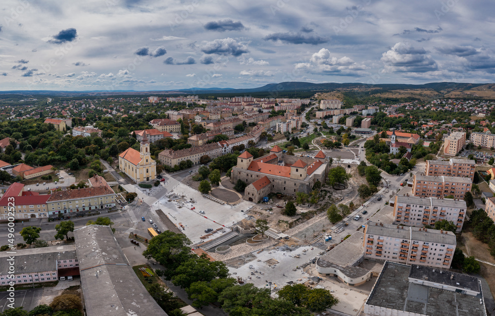 Aerial view of medieval town center of Varpalota with four tower Thury castle in the middle in Hungary