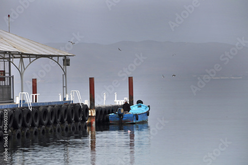 Peru. Pequeño puerto con barca en la costa de Peru. photo