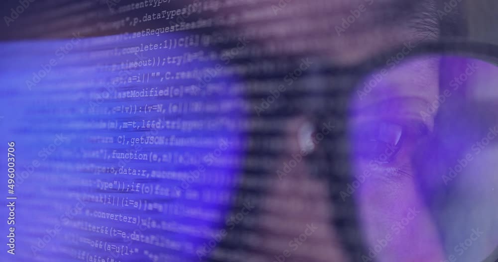 4K video super close up eye ball with eyeglasses overlay with coding screen. Background concept for programming and coding computing.