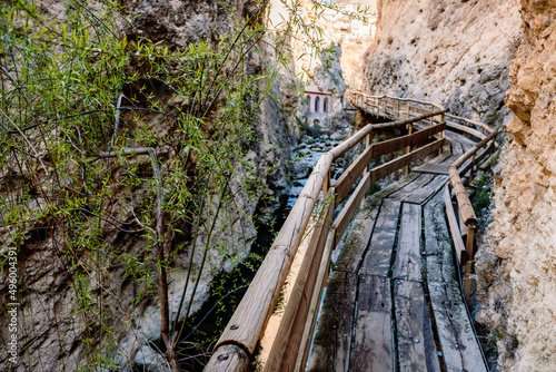 Wooden footbridge over a river in Castril, Andalusia.
