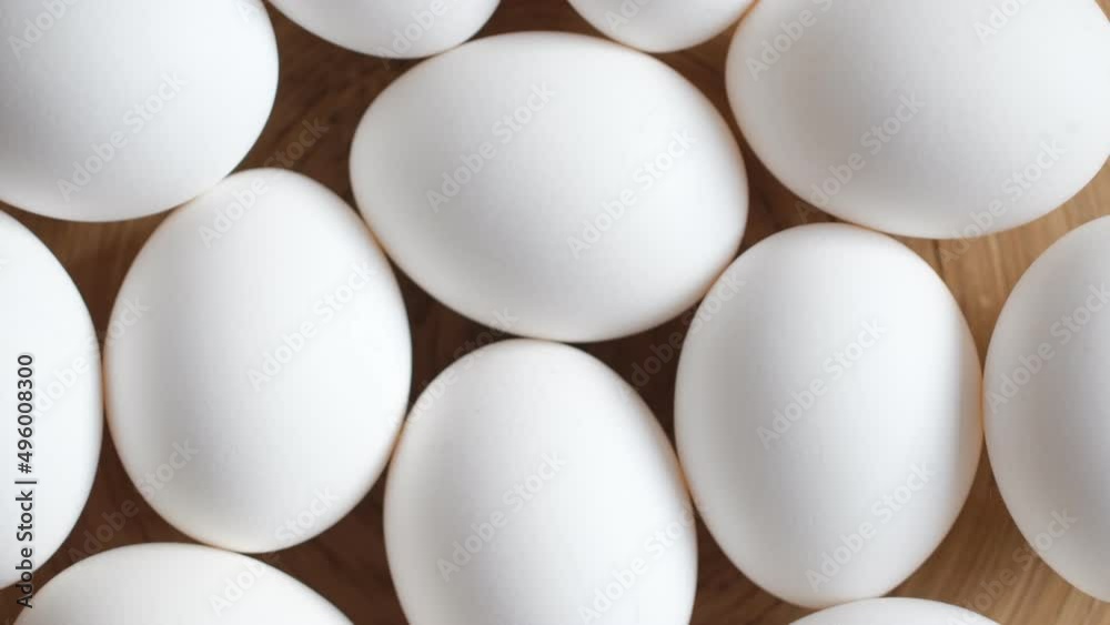 Chicken egg, rotation shot, Chicken fresh raw eggs.Healthy fresh food ingredients for breakfast. Animal products. Grocery. Chicken farm fresh eggs Chicken egg, rotation shot, Chicken fresh raw eggs.Healthy fresh food ingredients for breakfast. Animal products. Grocery. Chicken farm fresh eggs