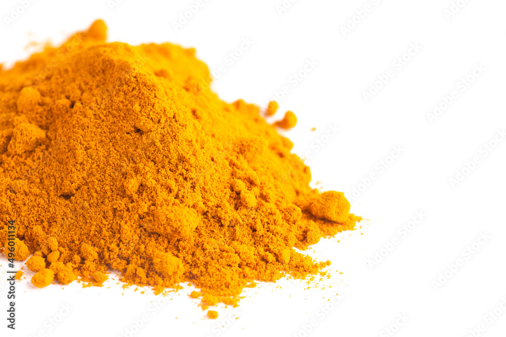 A Mound of Ground Turmeric on a White Background A Mound of Ground Turmeric on a White Background
