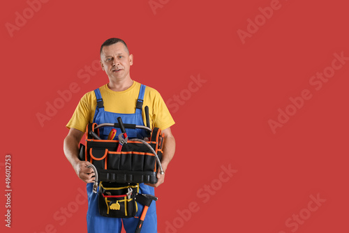 Handsome plumber with tools...