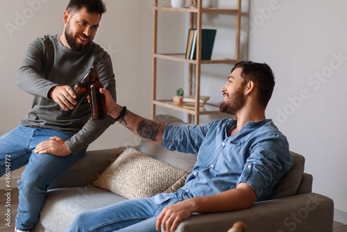 Male friends drinking beer ...