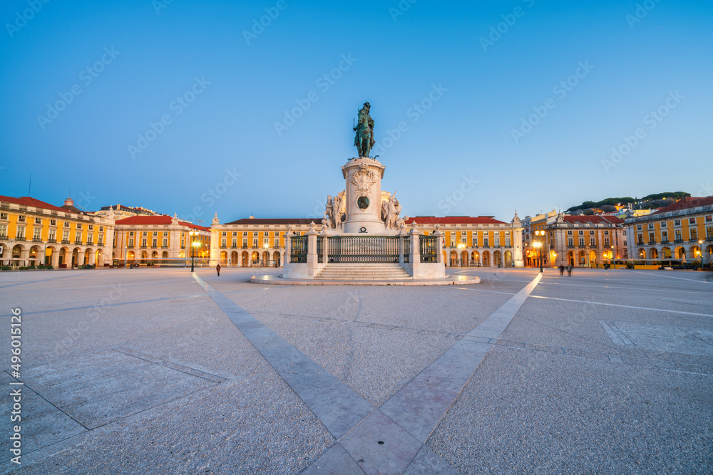 Commerce Square (Praca do Comercio) at sunrise with statue of of King Jose I and Rua Augusta Arch in Lisbon. Portugal