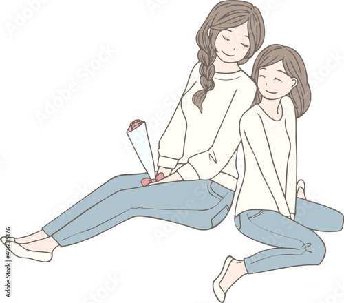 母の日にお母さんへカーネーションをプレゼントする女の子
