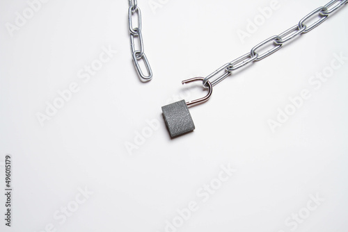 Chain and padlock on an isolated background. closed door. Metal chain.