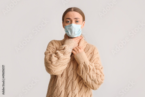 Ill young woman in medical ...