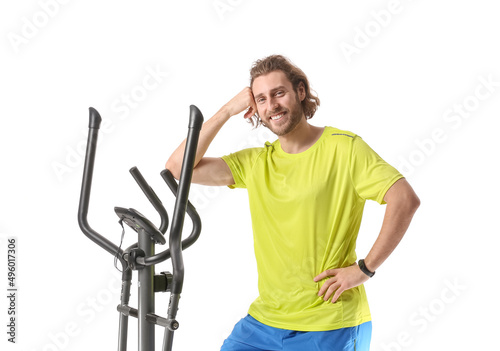 Sporty man with stepper mac...
