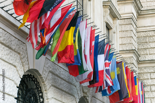 The flags of Organization for Security and Co-operation in Europe countries near headquarters of OSCE in Vienna, Austria photo