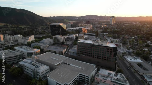 Dynamic aerial drone footage of Burbank, California at sunset photo