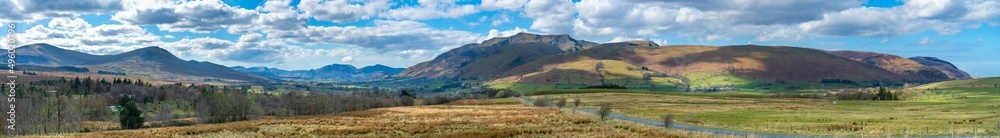 Beautiful panoramic view of Lake District valley overlooking Blencathra Hill and High Seat peaks. Cumbria, England