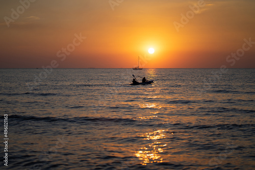 the sea, the beach in the evening when the sun goes down