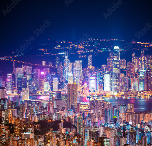 epic view of Hong Kong Night, from Kowloon to Hong Kong Island. metropolis in Asia, aerial, amazing colorful cityscape