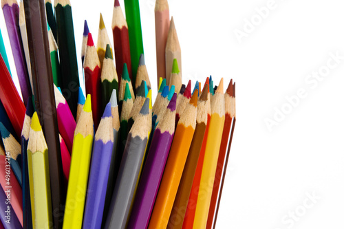 A bunch of colorful pencils on white background