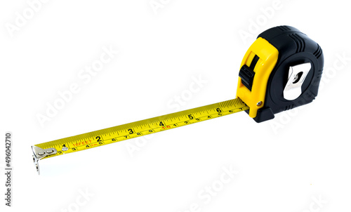 Yellow tape measure on white background © xy
