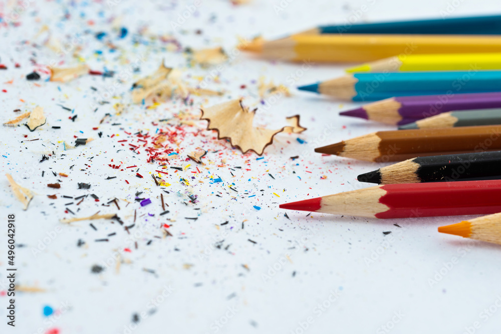Color pencils and pencil shavings on white background Color pencils and pencil shavings on white background