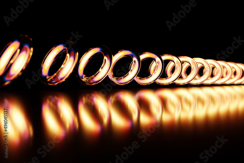 3d illustration of golden toruses in even rows on a monocrome background. Pattern with the same beads.