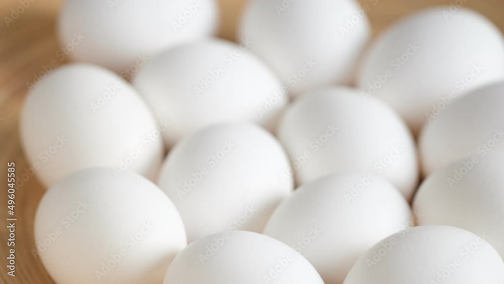 Chicken egg, rotation shot, Chicken fresh raw eggs.Healthy fresh food ingredients for breakfast. Animal products. Grocery. Chicken farm fresh eggs Chicken egg, rotation shot, Chicken fresh raw eggs.Healthy fresh food ingredients for breakfast. Animal products. Grocery. Chicken farm fresh eggs