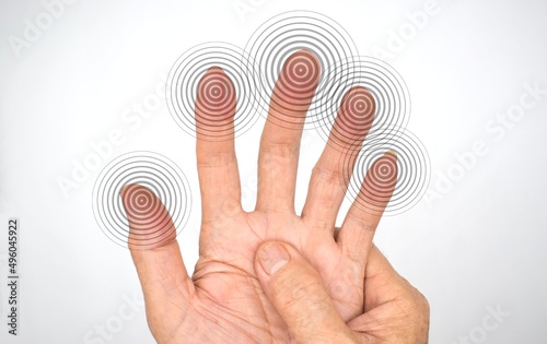Tingling and numbness in fingertips of Asian man with diabetes. Finger sensation, hand and nerves problems. Fine touch photo