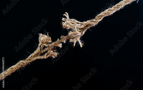 Obraz na płótnie Broken rope on black background