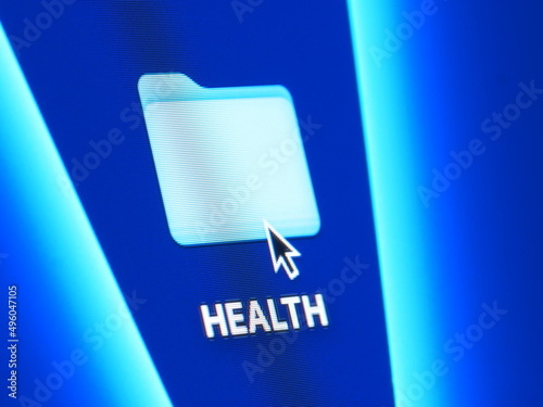Health - macro shot of folder on computer desktop with mouse pointer - zooming in on screen pixels