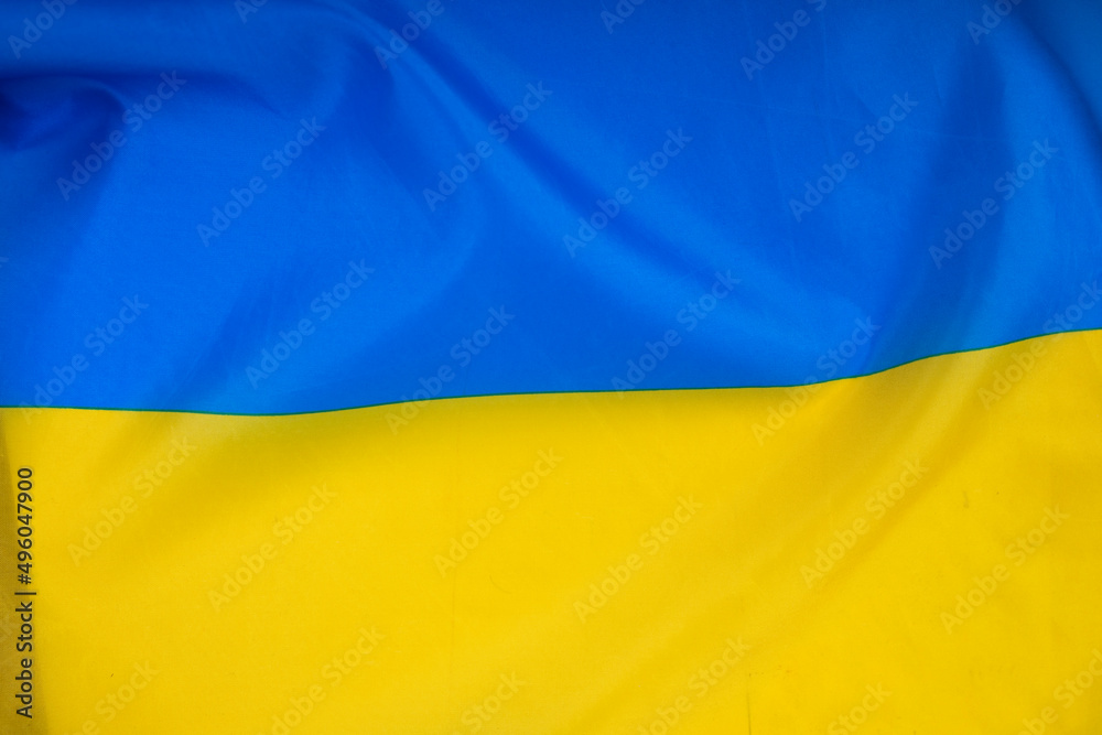 National flag of Ukraine fabric textile background National flag of Ukraine fabric textile background