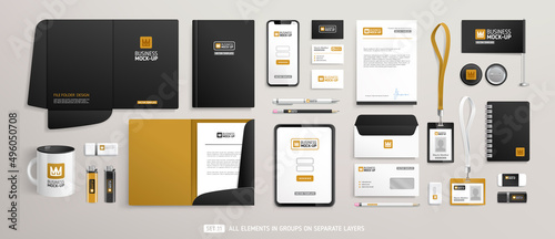 Stationery Brand Identity Mock-Up set with black and brown design. Business office stationary mockup template of File folder, annual report, envelope, brochure, tablet, souvenirs. Editable vector  photo