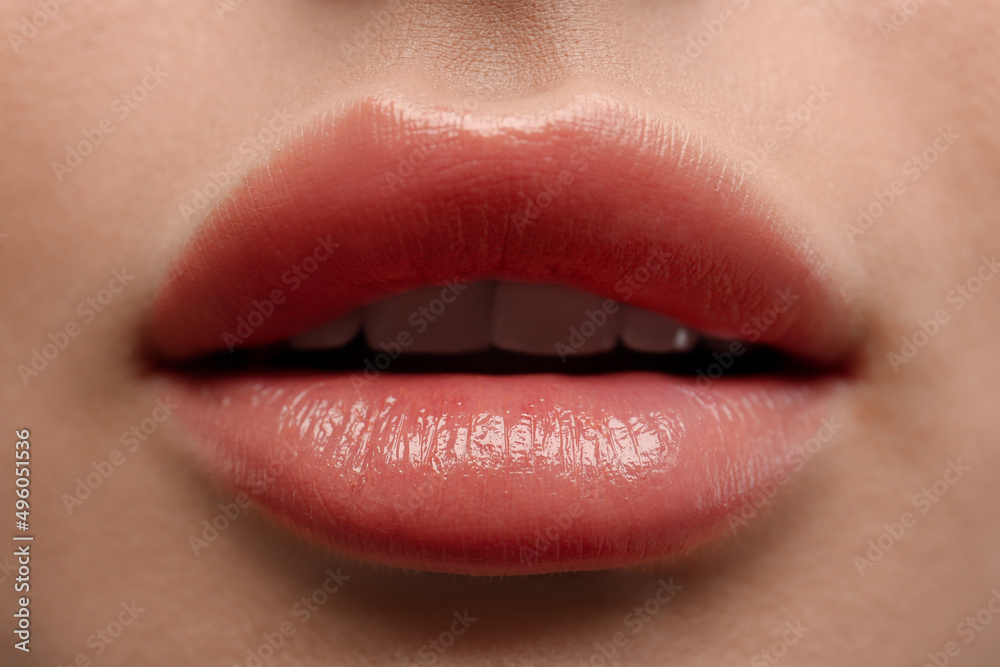 Closeup view of woman with beautiful lips Closeup view of woman with beautiful lips