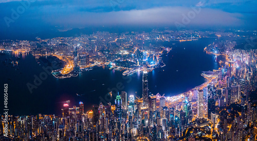 Amazing night aerial view of cityscape of Victoria Harbour  center of Hong Kong