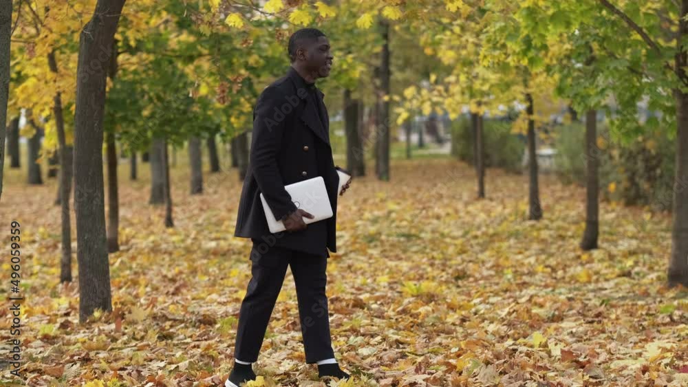 Work break. Park walk. Outdoor recreation. Dreamy cheerful man executive with coffee laptop enjoying outside leisure at autumn forest copy space. Work break. Park walk. Outdoor recreation. Dreamy cheerful man executive with coffee laptop enjoying outside leisure at autumn forest copy space.